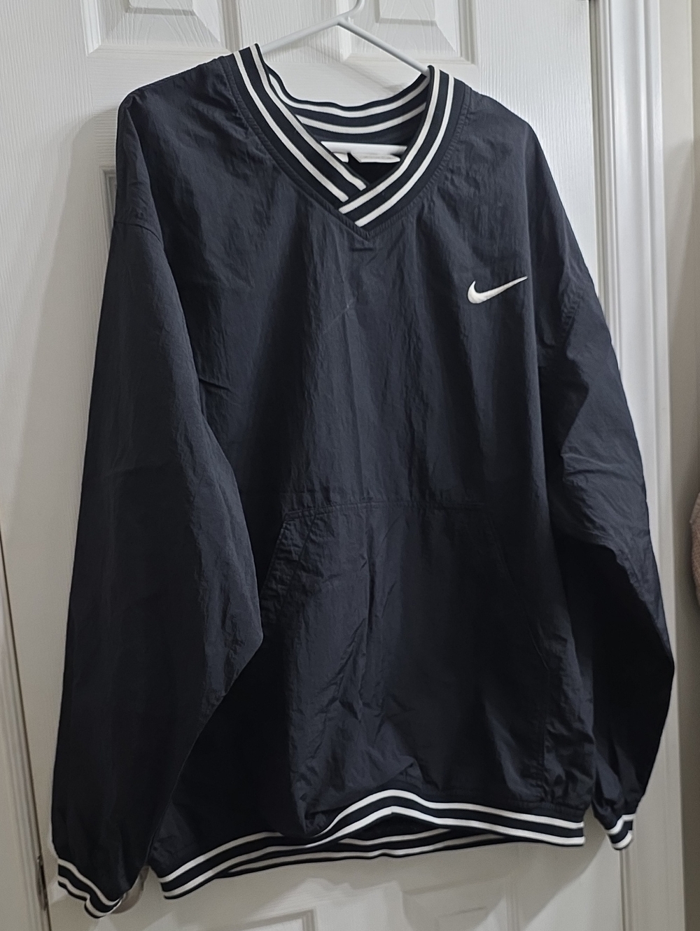 Nike Black Pullover with White Swoosh and Striped Trim
